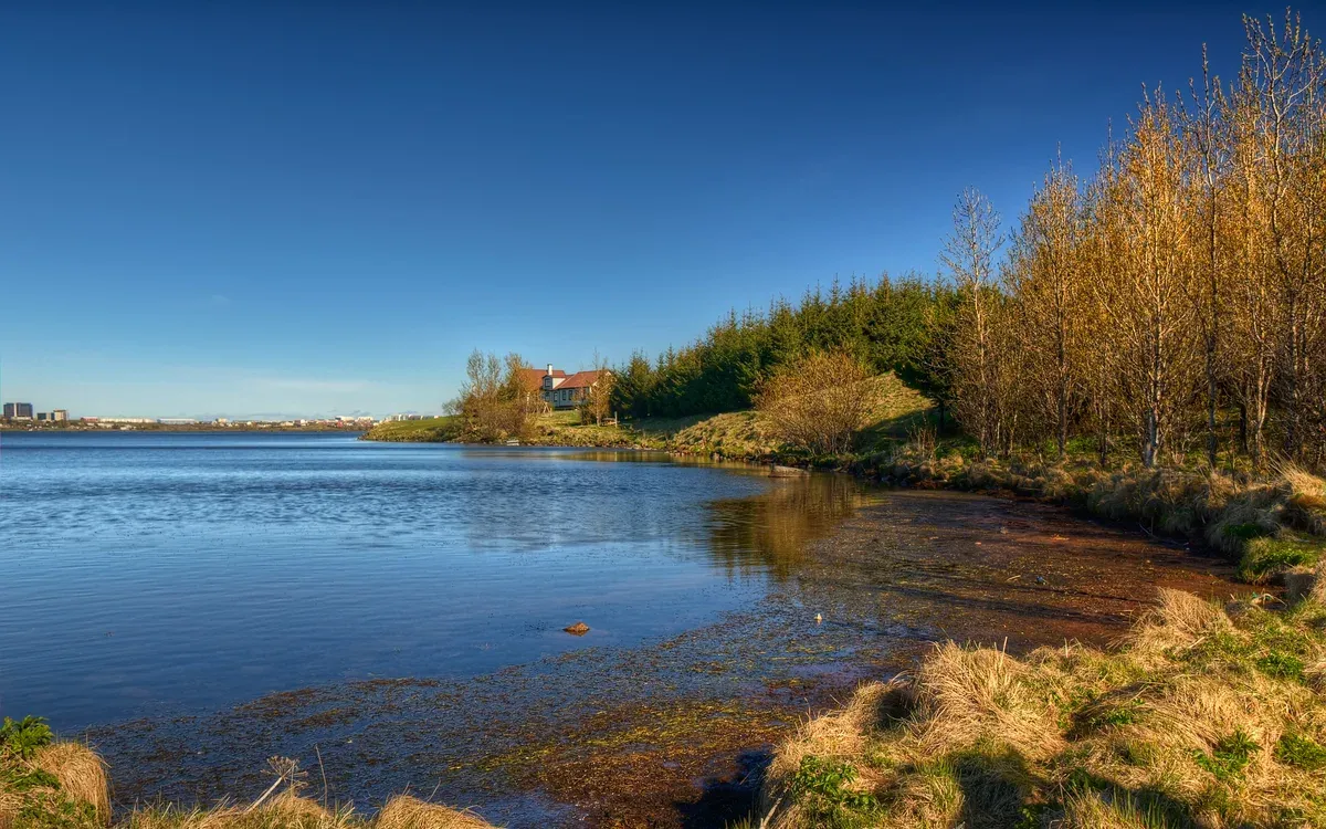 Elliðavatn lake on the edge of Reykjavik in autumn, a day-permit water under the fishing license rules in Iceland