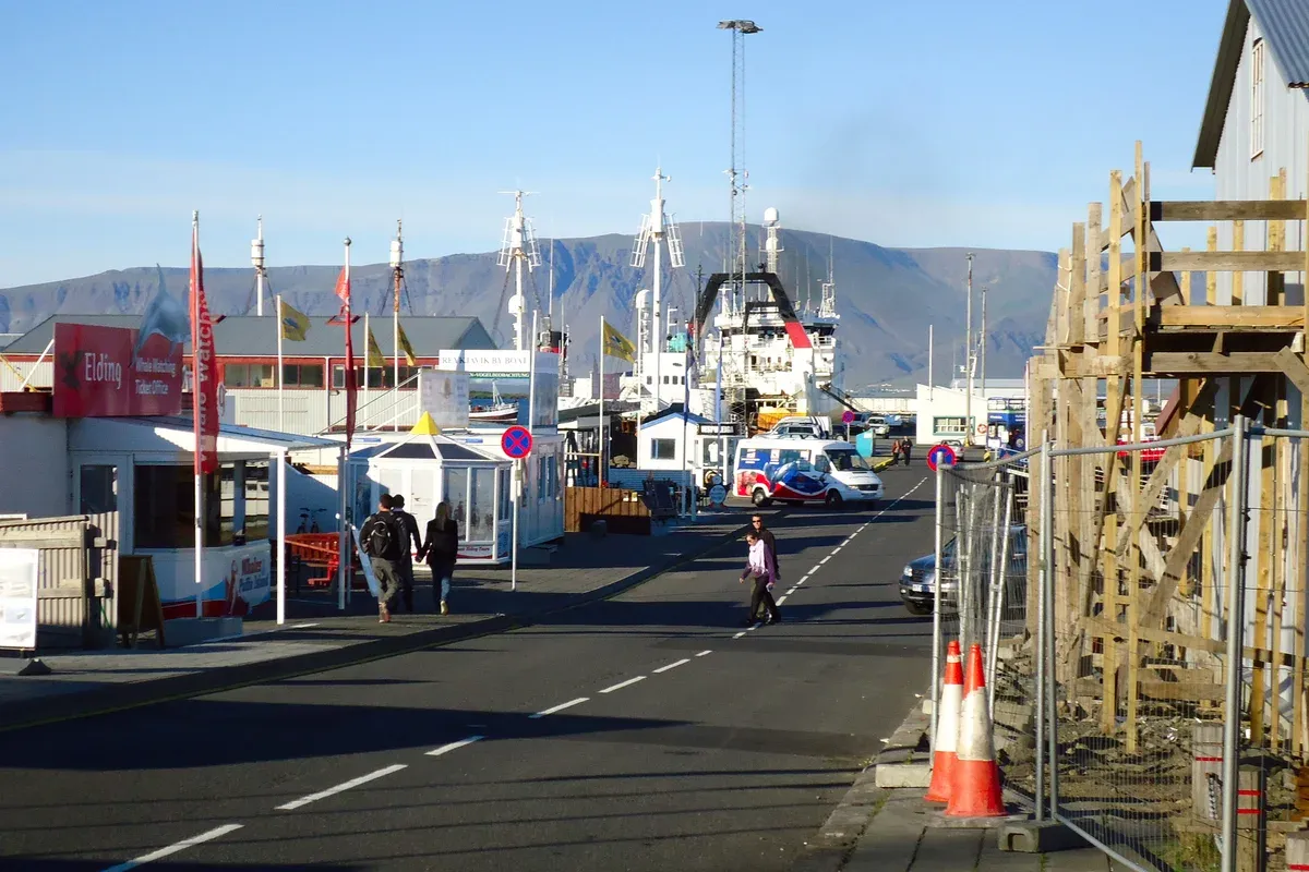 Ticket kiosks and whale-watching boats along Reykjavik Old Harbour, where most fishing tours in Iceland depart